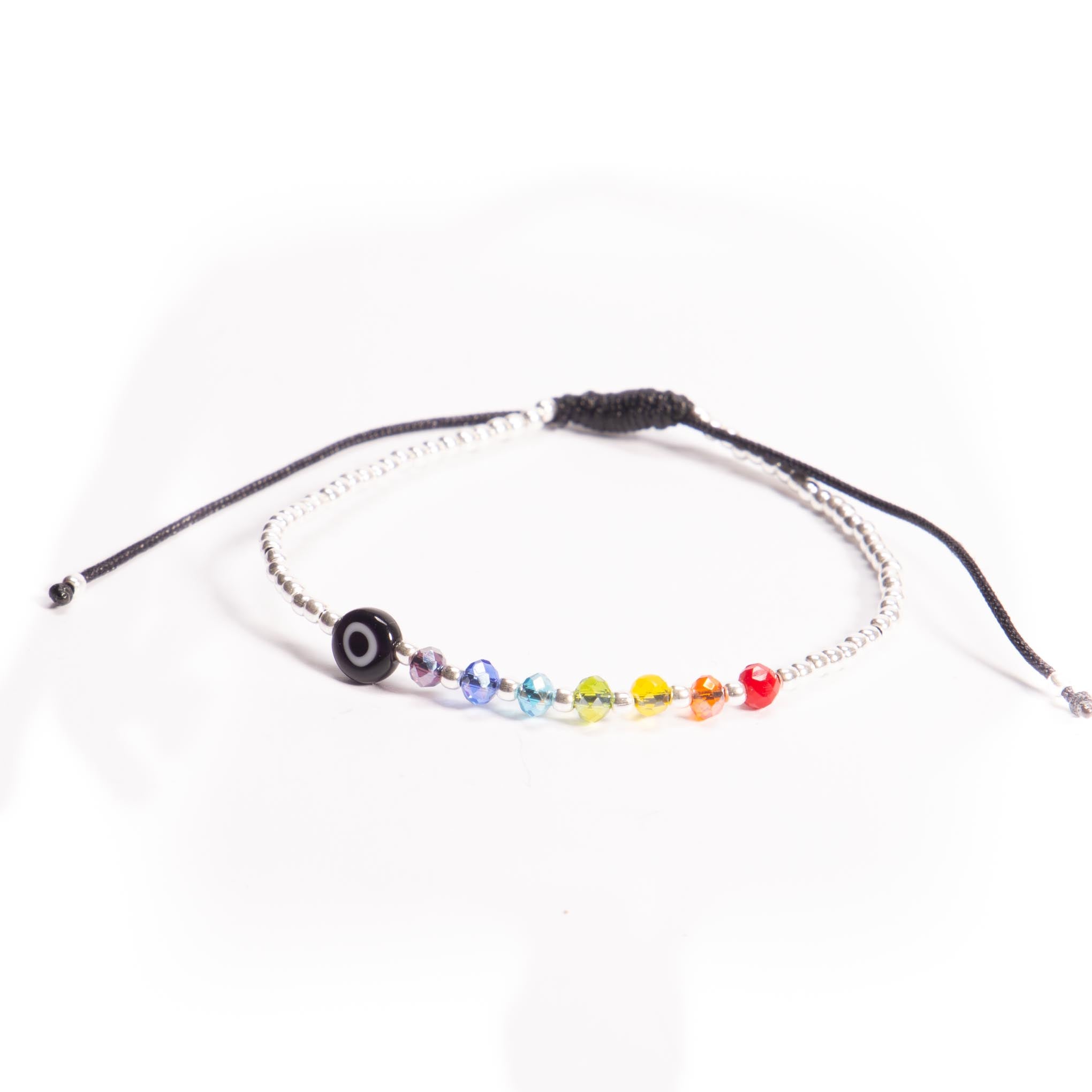 Pulsera de hilo con ojo turco, cristalitos y bolitas de plata de plata mexicana