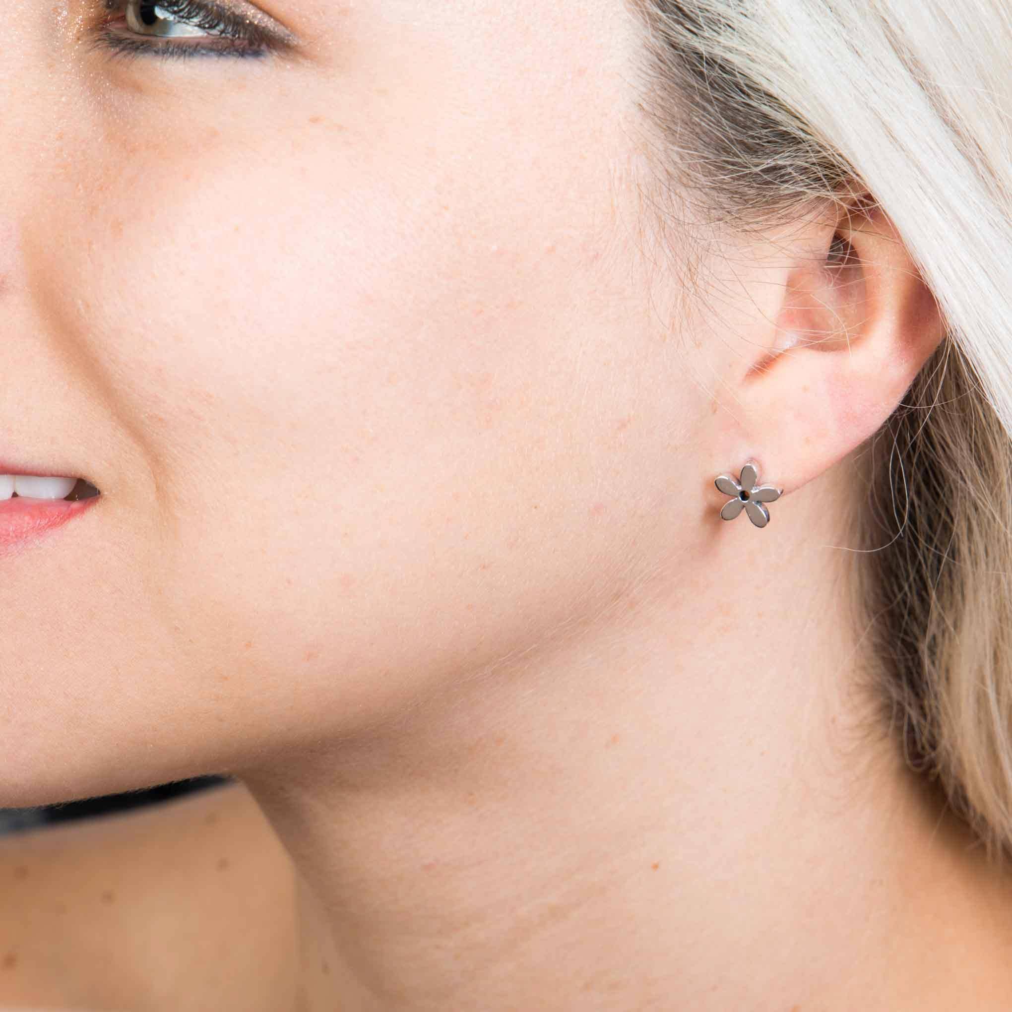 Aretes estilo margarita de Plata